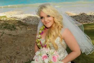 Bride in lei with bouquet