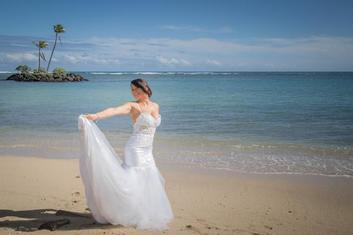 bride dancing on the beach
